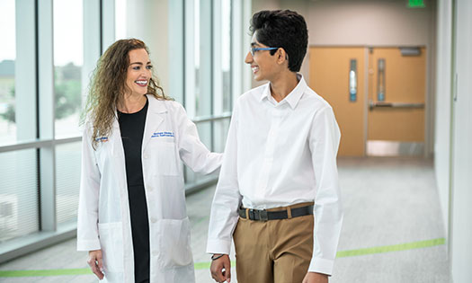 Armaan walking with physician
