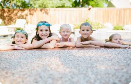 children-in-pool-458-X-294